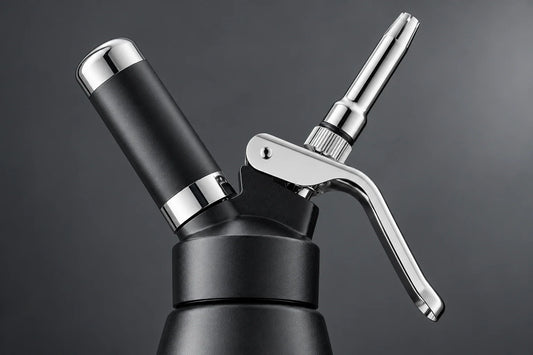 Close-up of the Kaiser Chef cream whipper nozzle, head and lever